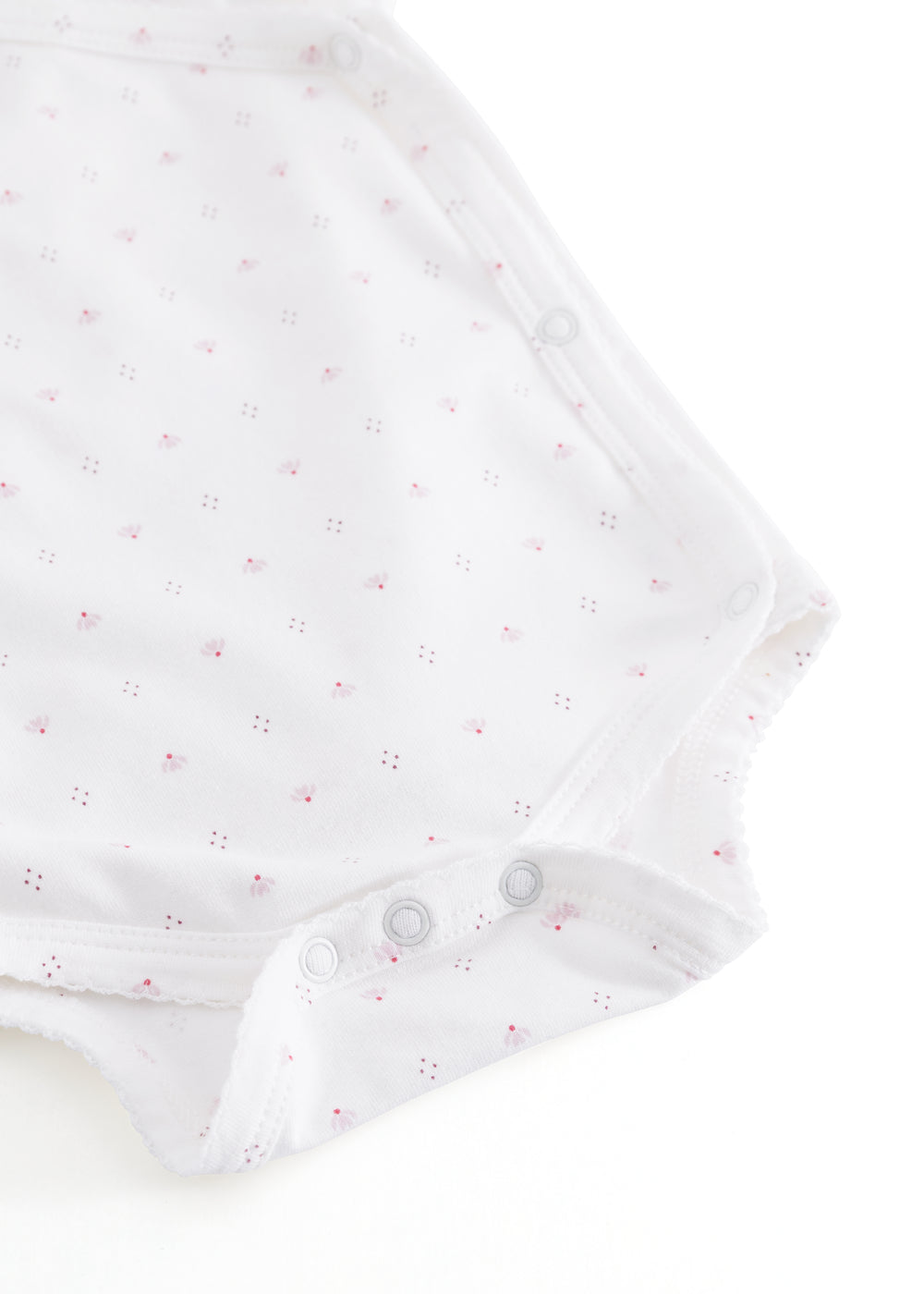 Hvid baby bodystocking med små blomster