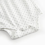 Hvid baby bodystocking med fint mønster