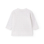 Hvid babybluse med slå-om lukning og små blomster