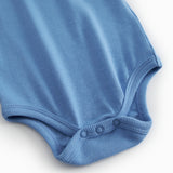 Blå bodystocking med flæsekrave til baby