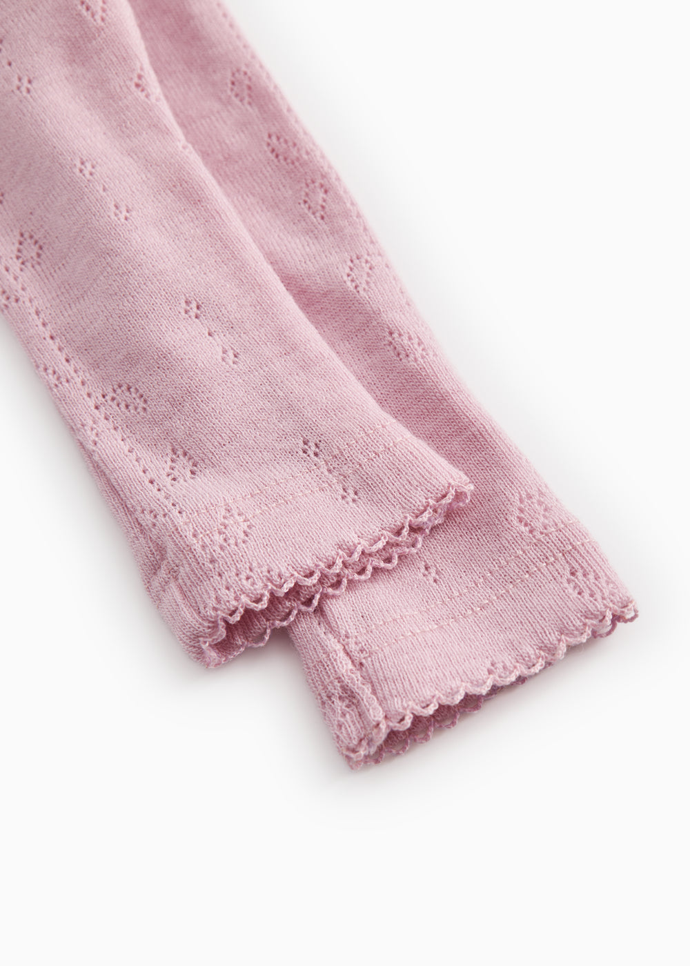 Babybukser i soft berry med elastisk kant nederst og blomstret jacquardmønster