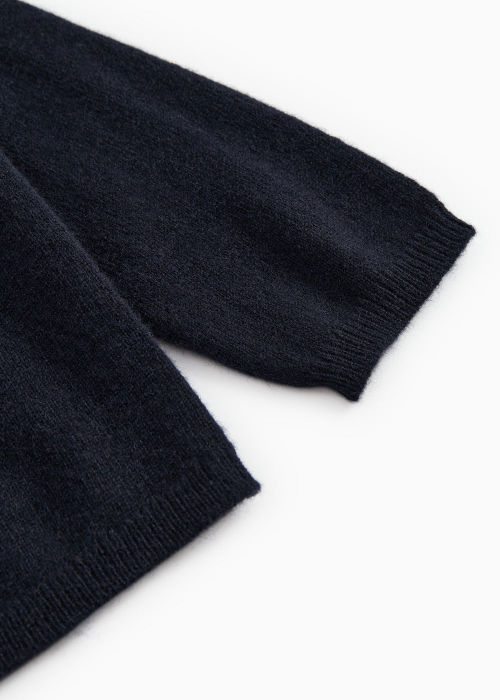 Mørk indigo babycardigan-ærme med ribkant ved manchet og fald