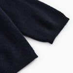 Mørk indigo babycardigan-ærme med ribkant ved manchet og fald