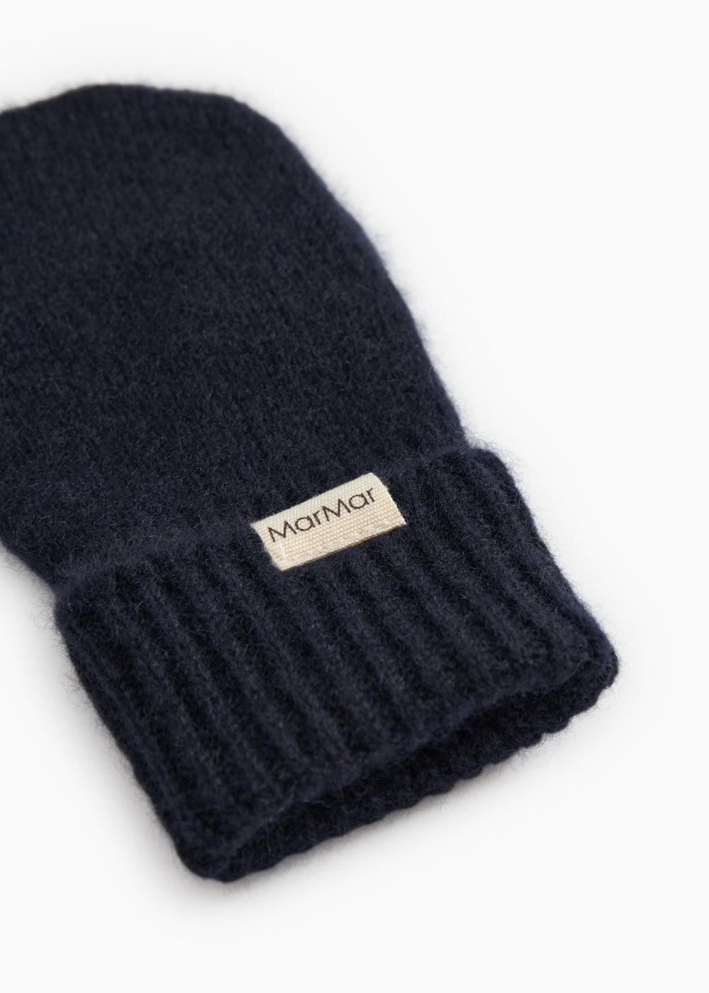 Baby-luffer i mørk indigo med ribstrikket manchet og MarMar-mærke