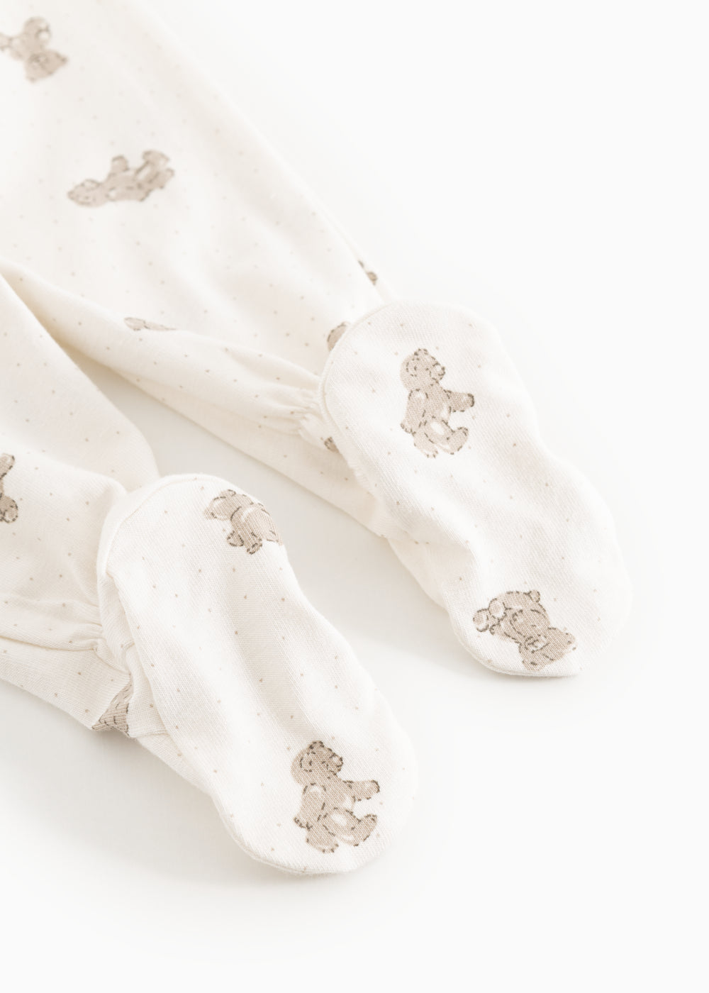 Creme babybukser med teddybjørneprint og elastiske manchetter ved ankler