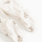 Creme babybukser med teddybjørneprint og elastiske manchetter ved ankler