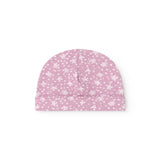 Lyserød babysommercaps/hue med små hvide blomsterprint og lodret syning i front
