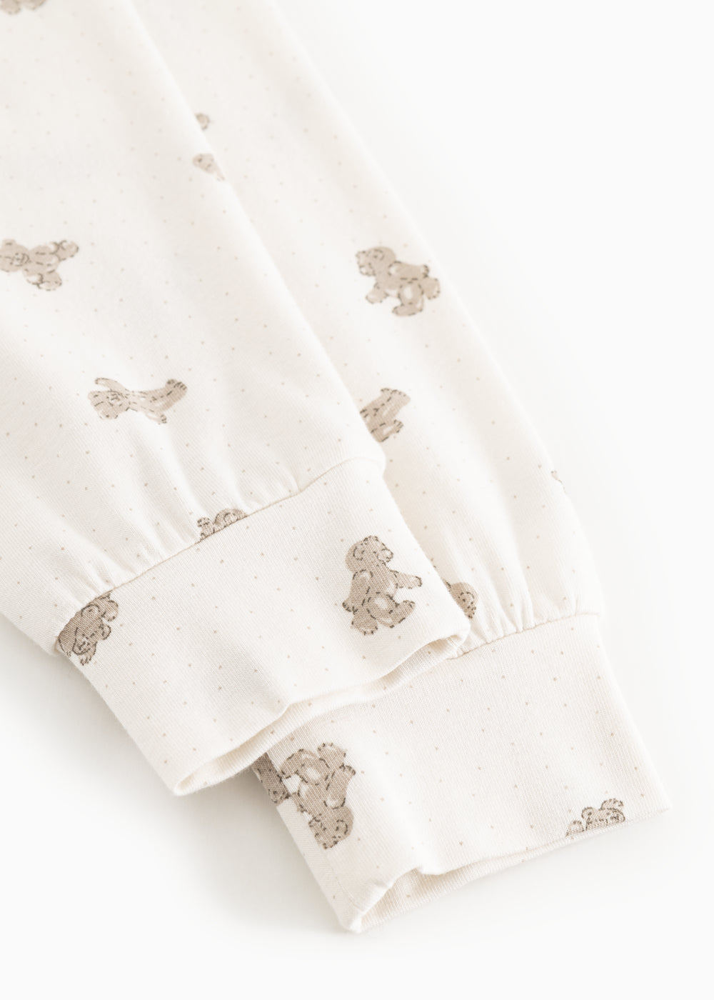Pyjamasbukser i offwhite med teddy-bjørneprint ved manchet og benkant