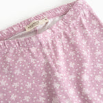 Lyserøde leggings med små blomsterprint og elastisk linning