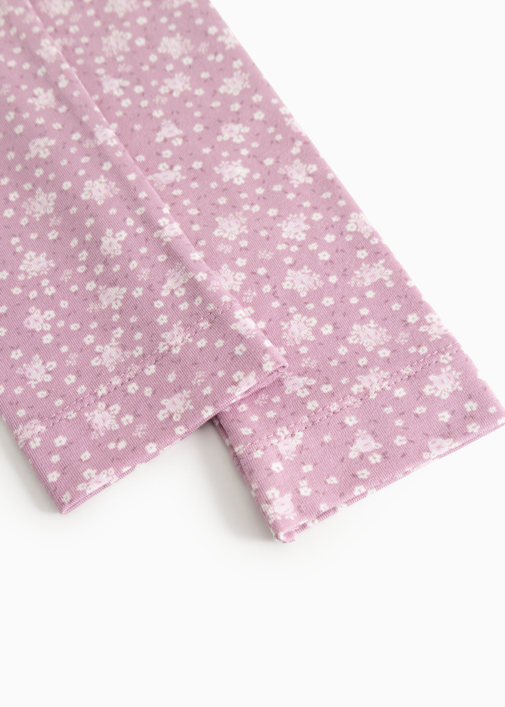 Lyserøde leggings med små blomsterprint og smal benafslutning