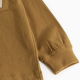 Karamelbrun langærmet bluse med elastisk manchet og søm ved bunden