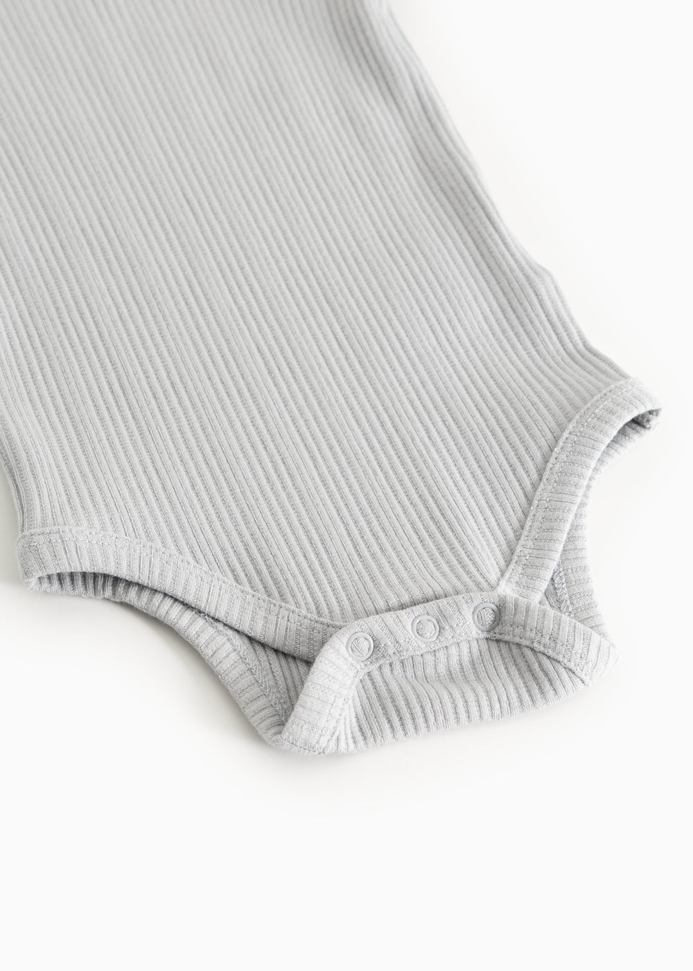 Bodystocking i lys gråblå ribstrik med elastisk benåbning