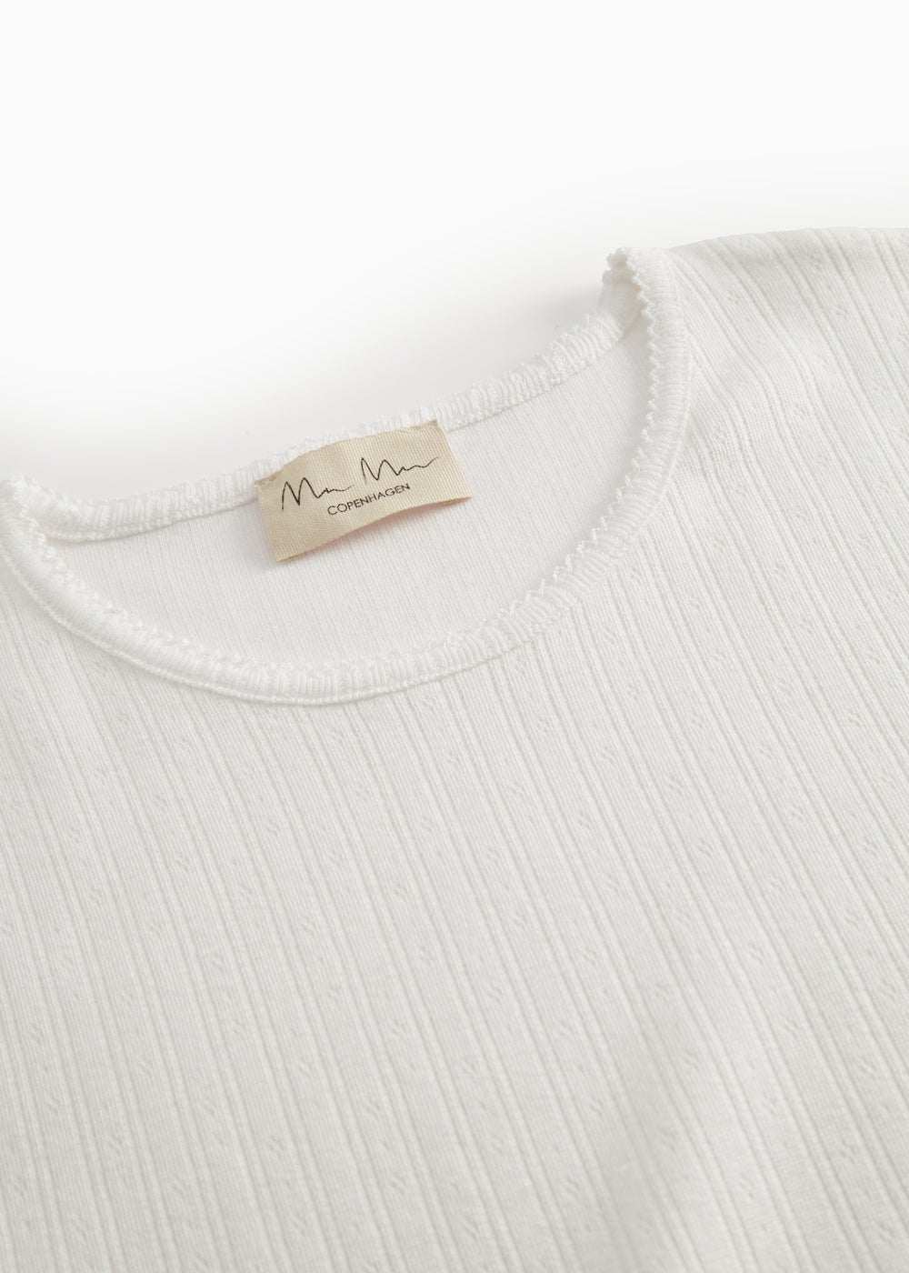 Hvid langærmet pointelle t-shirt til kvinder