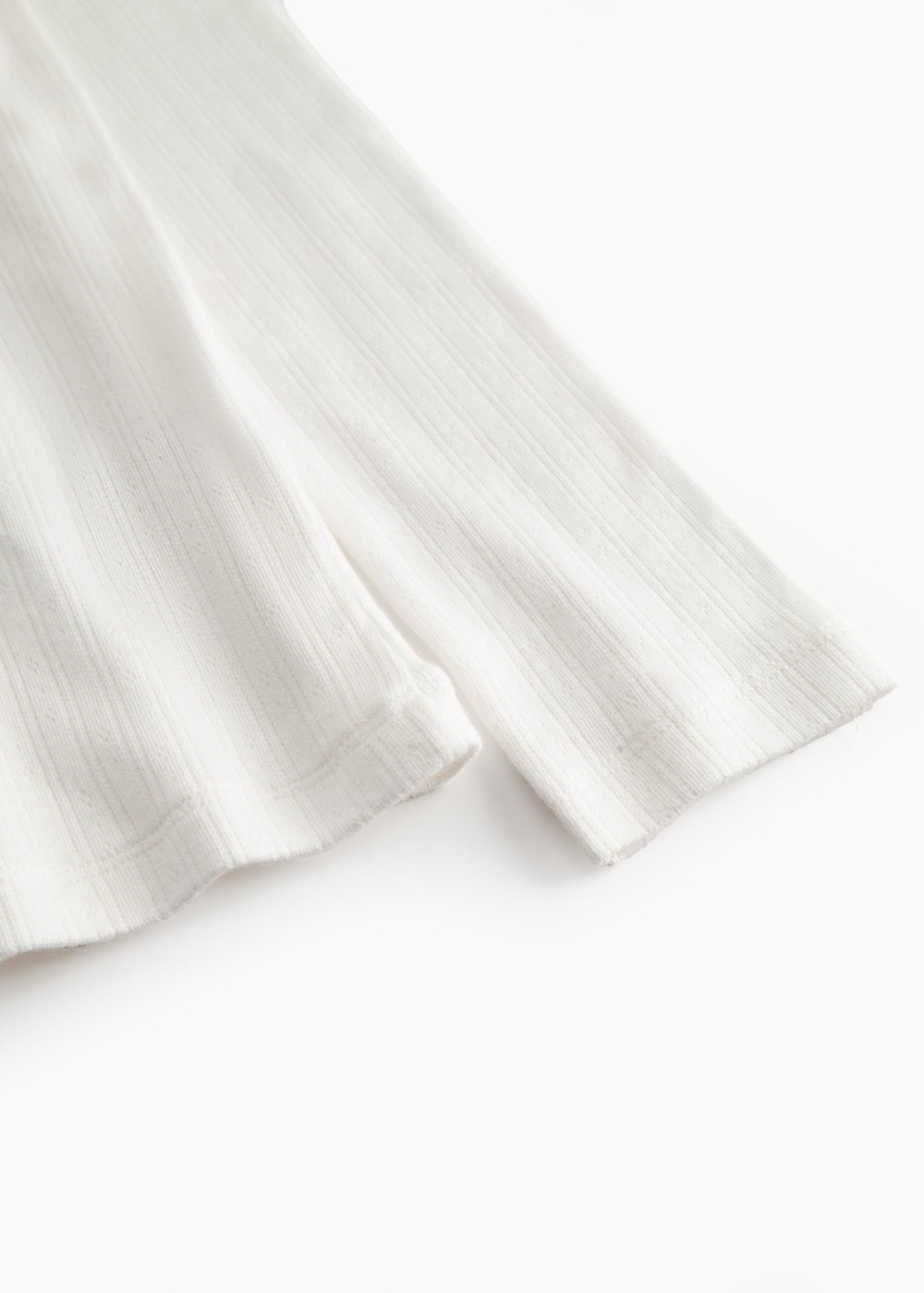 Hvid langærmet pointelle t-shirt til kvinder