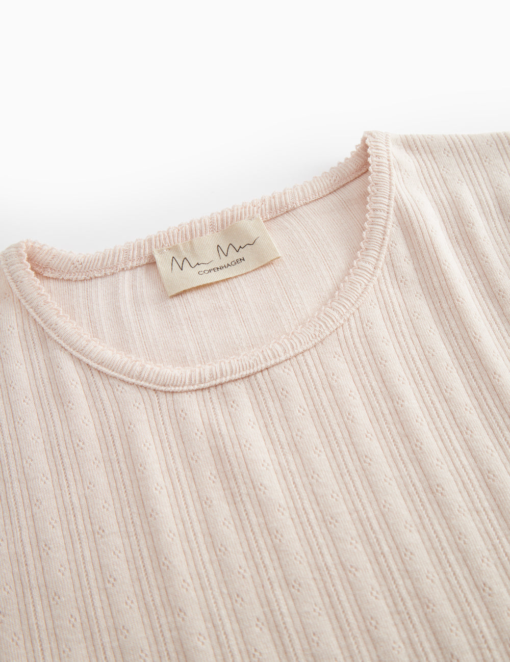 Lyserød langærmet pointelle t-shirt til kvinder