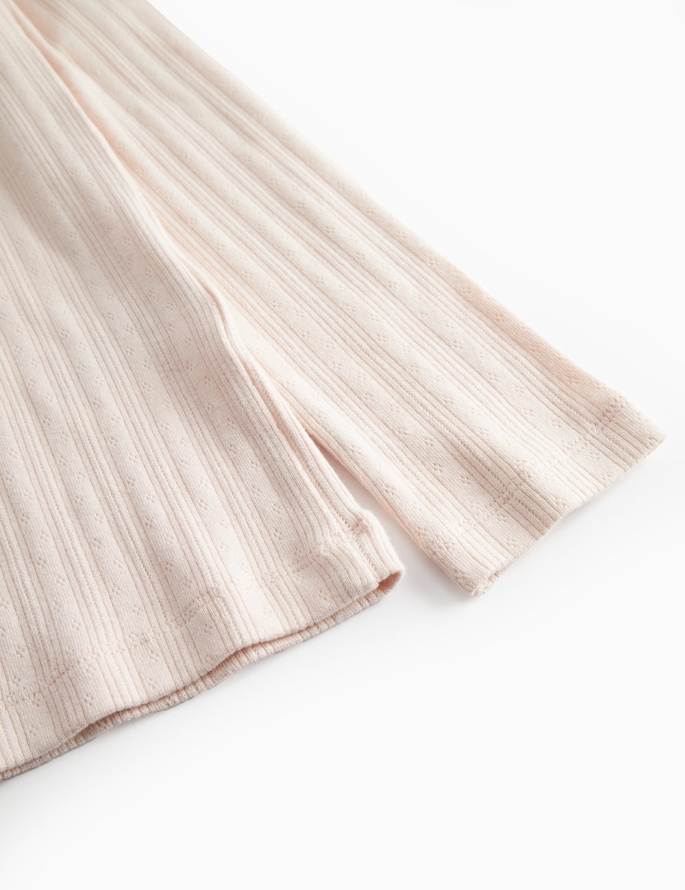 Lyserød langærmet pointelle t-shirt til kvinder