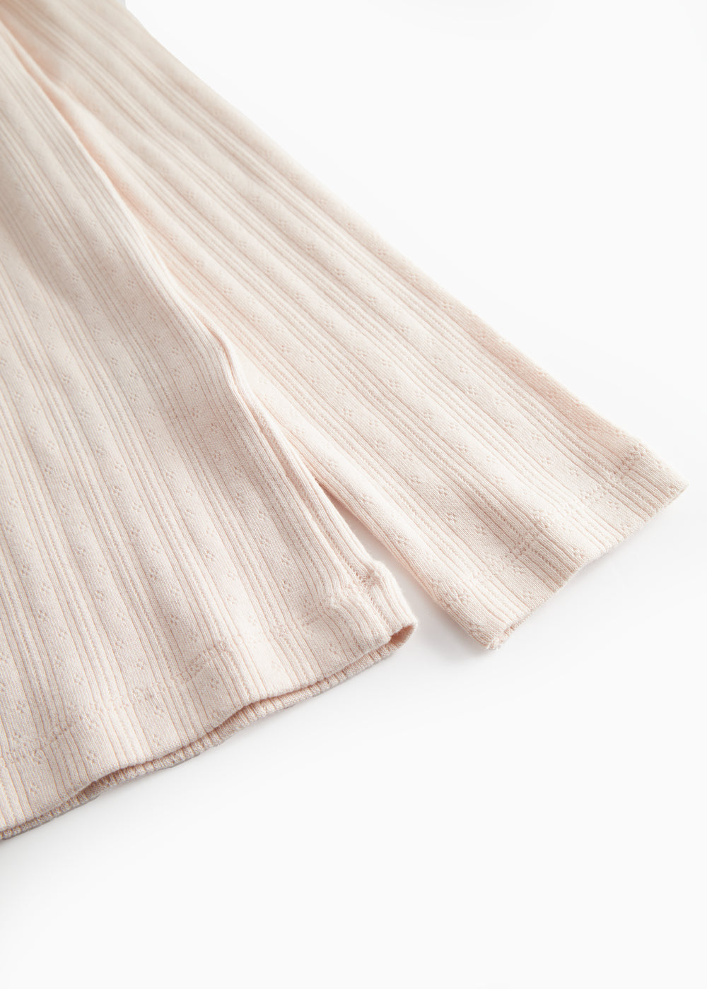 Lyserød langærmet pointelle t-shirt til kvinder